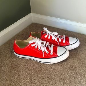 Brand new size 7.5 women Converse Sneakers. Never worn. RED